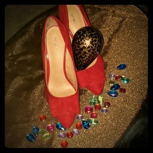Red suede heels with bow